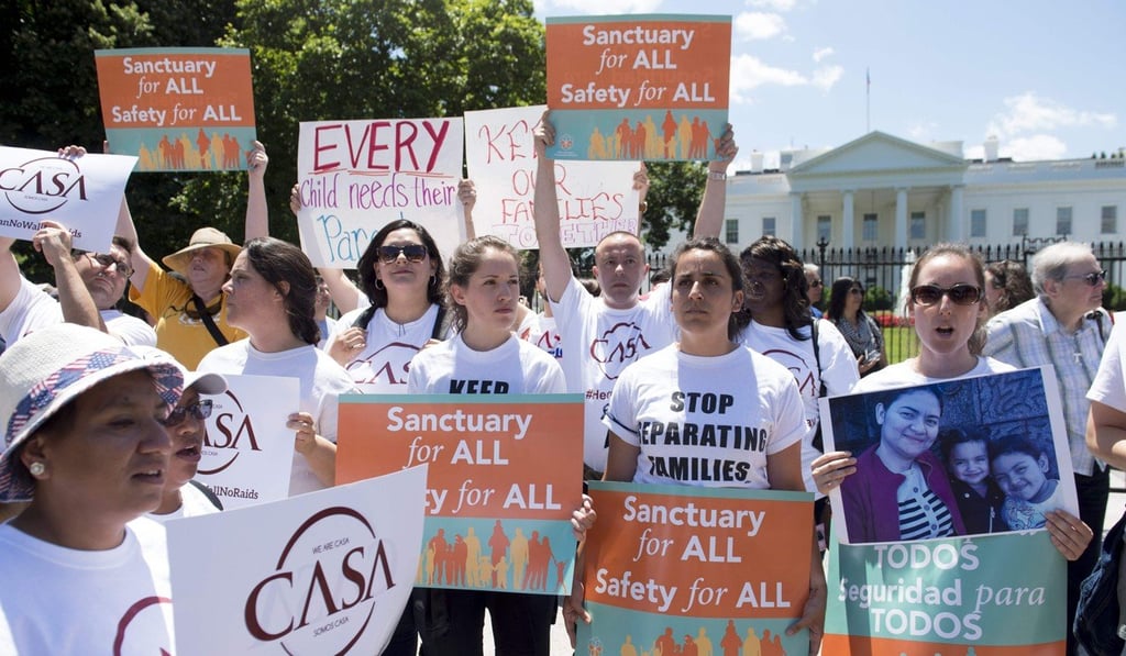Demonstrators with the organization CASA protest US President Donald Trump's immigration and deportation policies during a rally outside the White House in Washington. Photo: AFP Demonstrators with the organization CASA protest US President Donald Trump's immigration and deportation policies during a rally outside the White House in Washington. Photo: AFP