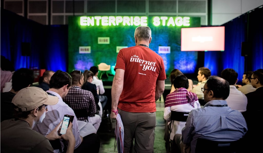 Visitors and participants wait for a talk to start at the inaugural Rise technology conference in Hong Kong, on in July 2015. Start-up entrepreneurs and big industry names participated in the event. Photo: AFP
