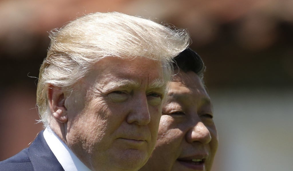 US President Donald Trump, left, and Chinese President Xi Jinping walk together at Trump’s Mar-a-Lago estate in Palm Beach, Florida in April. Photo: Associated Press