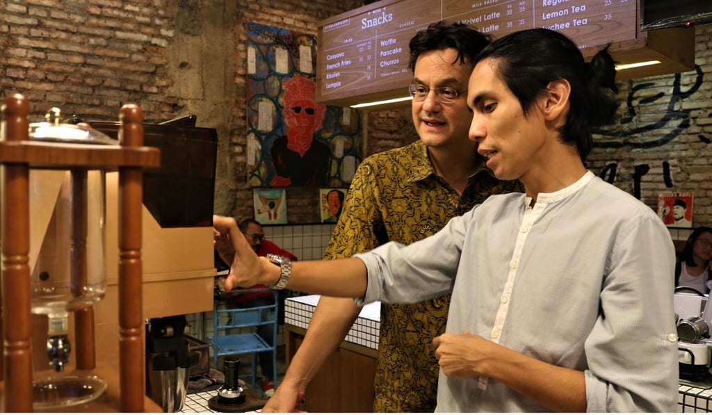 Angga Sasongko, in addition to being a director of a coffee-themed film, is also good at making coffee at his shop in the Blok M Jakarta area. Photo: Karim Raslan