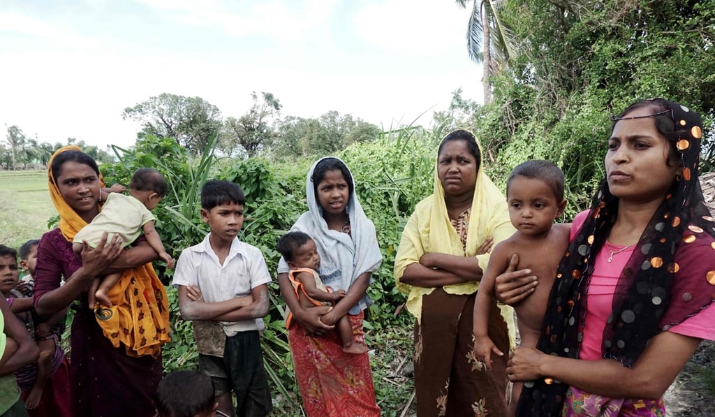 Women who claim they were raped by soldiers during a clearance operation north of Rakhine State last year. Photo: AFP.”
