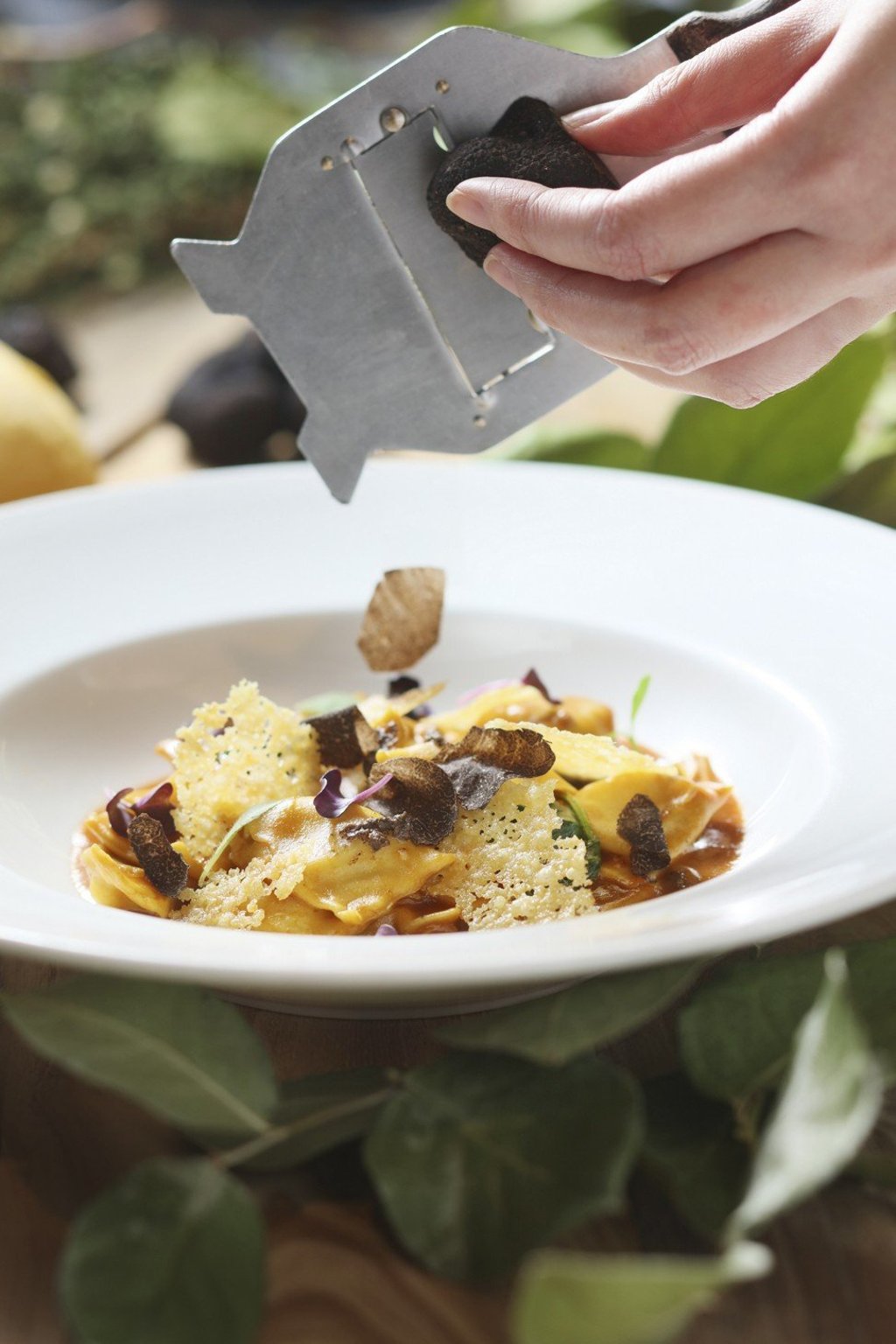 House-made beef and spinach ravioli with demi-glace and black truffle at Cucina.