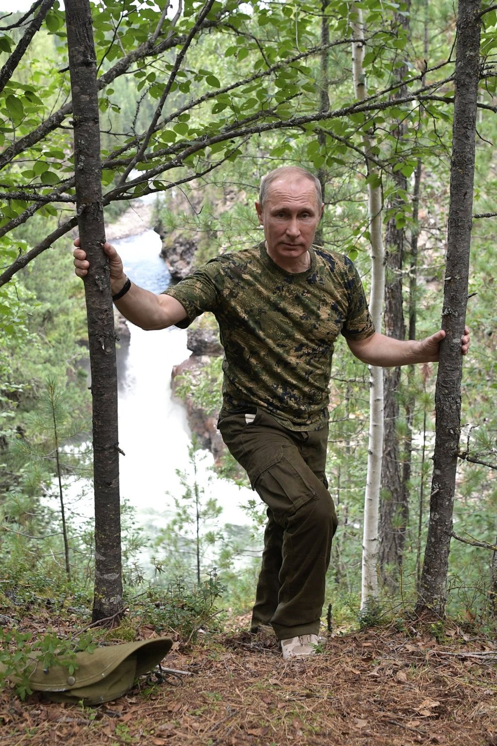 Putin during a walking trip in the mountains. Photo: EPA Putin during a walking trip in the mountains. Photo: EPA