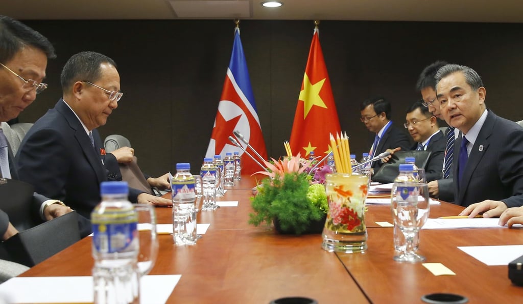 North Korean foreign minister Ri Yong-ho, second from left, prepares for a meeting with his Chinese counterpart Wang Yi, right, on Sunday. Photo: AP North Korean foreign minister Ri Yong-ho, second from left, prepares for a meeting with his Chinese counterpart Wang Yi, right, on Sunday. Photo: AP