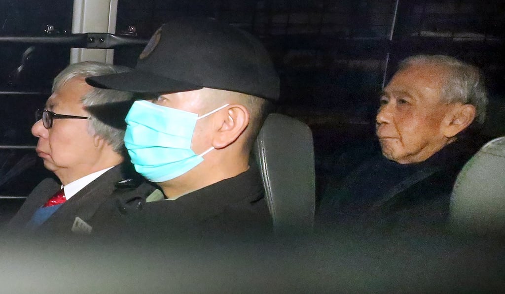 Tycoon Thomas Kwok (left) and former chief secretary Rafael Hui (right) on their way to a hearing at the High Court in March last year. Photo: Edward Wong