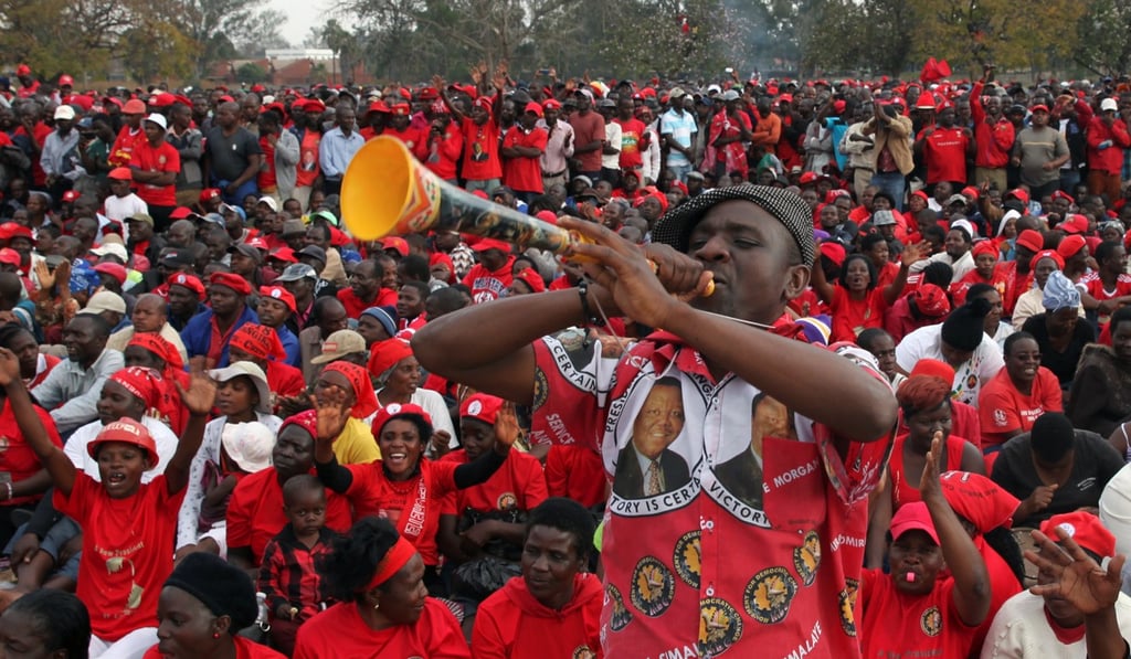 Supporters of the opposition Movement for Democratic Change (MDC) of Morgan Tsvangirai attend a rally in Harare, Zimbabwe, August 5, 2017. REUTERS/Philimon Bulwayo