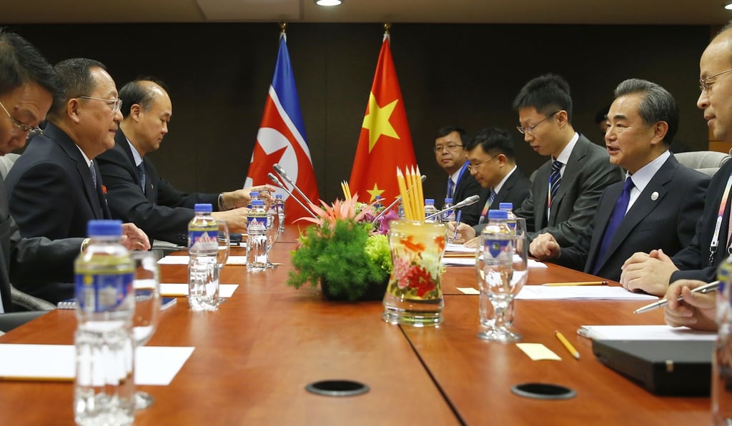 North Korean Foreign Minister Ri Yong Ho, second from left, prepares for a meeting with his Chinese counterpart Wang Yi, second from right, in the sidelines of the Asean Foreign Ministers' Meeting and its Dialogue Partners Sunday. Photo: AP North Korean Foreign Minister Ri Yong Ho, second from left, prepares for a meeting with his Chinese counterpart Wang Yi, second from right, in the sidelines of the Asean Foreign Ministers' Meeting and its Dialogue Partners Sunday. Photo: AP