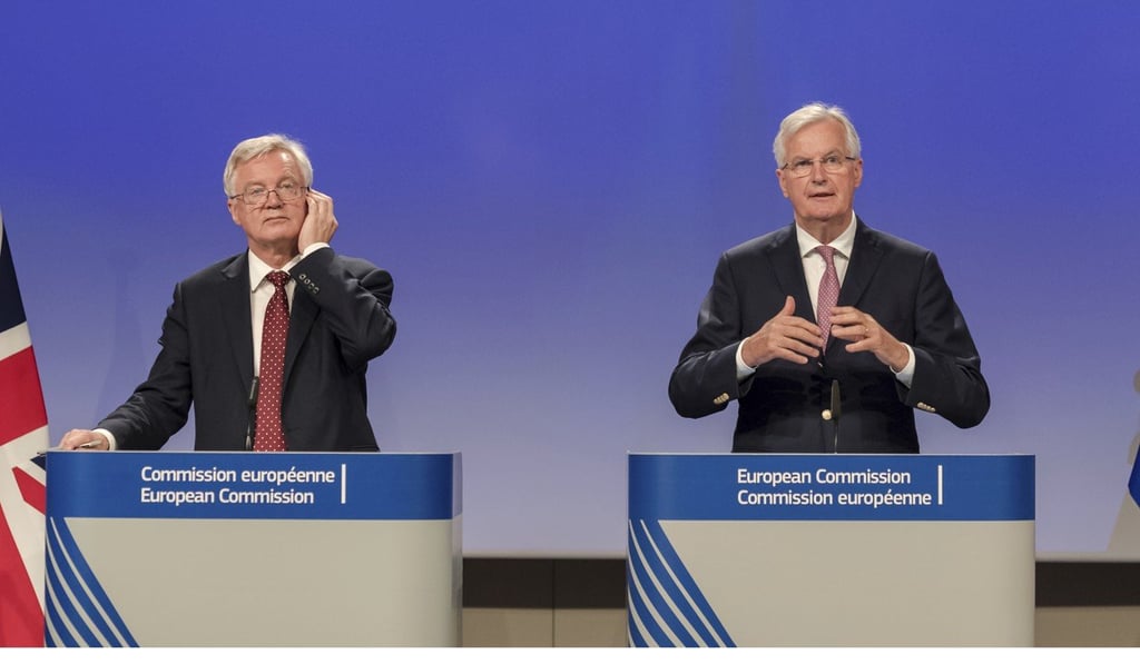 The EU chief Brexit negotiator Michel Barnier, right, and British Secretary of State David Davis. Photo: AP The EU chief Brexit negotiator Michel Barnier, right, and British Secretary of State David Davis. Photo: AP