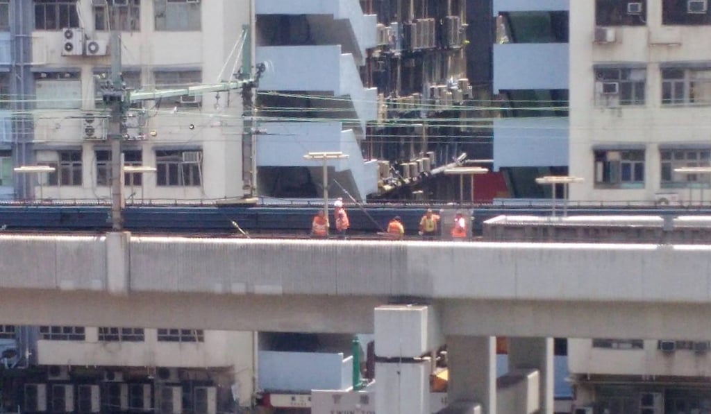 MTR staff working on a section of the track at Kwun Tong. Photo: Facebook