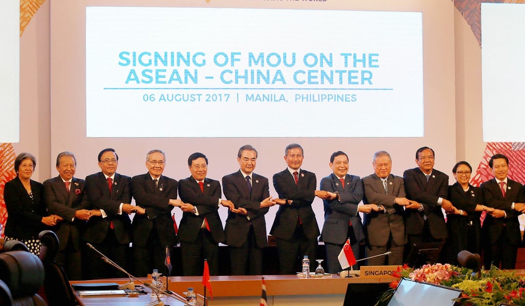 China’s Foreign Minister Wang Yi, sixth from left, attends a signing ceremony for a memorandum of understanding on establishing a China-Asean center in Manila. Photo: Xinhua