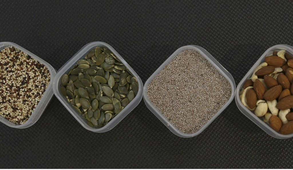 Hin Chun Chui gets some of his daily protein from quinoa, pumpkin seeds, chia seeds, almonds and pistachios. Photo: Xiaomei Chen