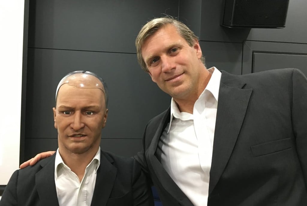 Istvan with Han, a robot developed by Hanson Robotics, at the 2016 Global Leaders Forum in Seoul, South Korea. Picture: courtesy of Zoltan Istvan