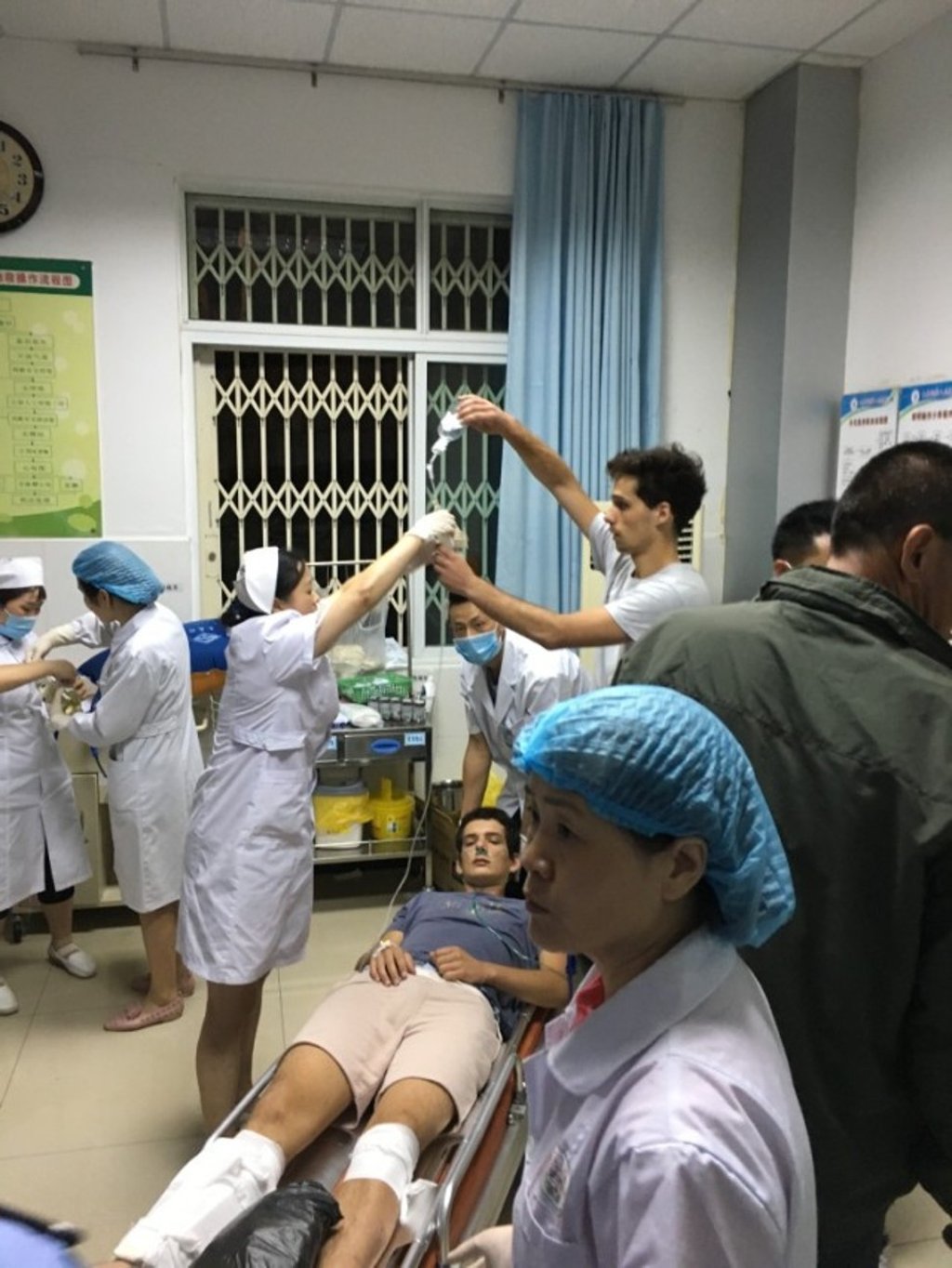 A foreign man receives treatment at Jiuzhaigou County People’s Hospital. Photo: Handout