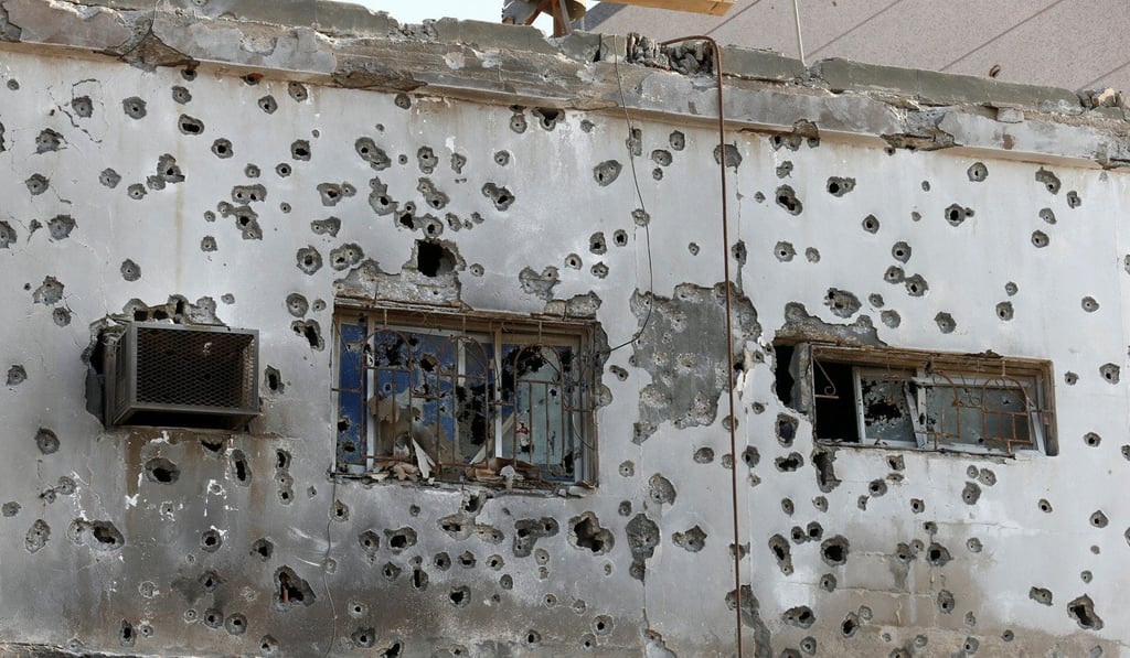 A building riddled by gunfire is seen following a security campaign against Shi'ite Muslim gunmen in the town of Awamiya, in the eastern part of Saudi Arabia on Wednesday. Photo: Reuters