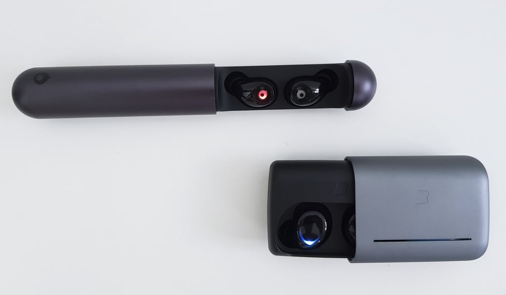 Crazybaby’s Air and Bragi Dash Pro (bottom) in their charging cases.