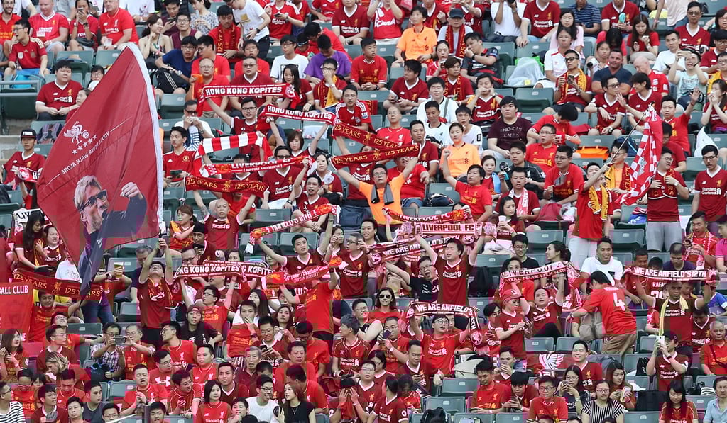 Liverpool fans cheer on their team at the Premier League Asia Trophy in Hong Kong Stadium. But how many of them are wearing counterfeit shirts? Photo: Edward Wong