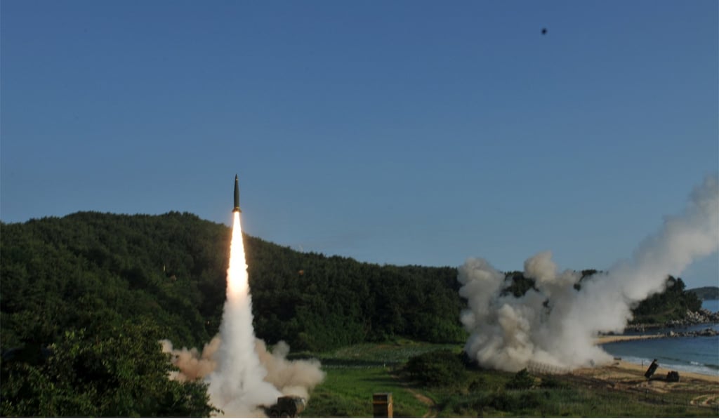 File photo of US and South Korean troops operating an American Army Tactical Missile System (ATACMS) and South Korean Hyunmoo Missile II fire missiles into the East Sea. Photo: Reuters