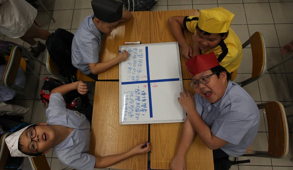 A national education class at a Hong Kong school in 2013. The introduction of mandatory national education has been controversial in Hong Kong, with opponents deriding it as “brainwashing”. Photo: Felix Wong