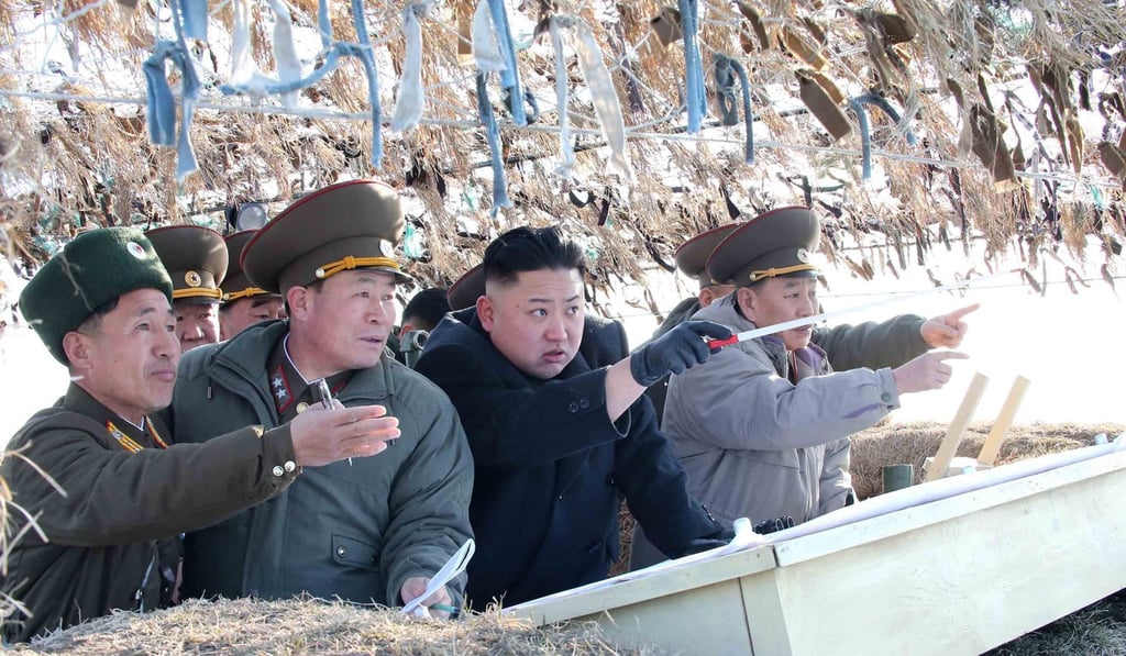 A photo released by KCNA news agency in 2013, shows North Korea leader Kim Jong-un visiting the Wolnae-do Defence Detachment on the western front line. Photo: MCT A photo released by KCNA news agency in 2013, shows North Korea leader Kim Jong-un visiting the Wolnae-do Defence Detachment on the western front line. Photo: MCT