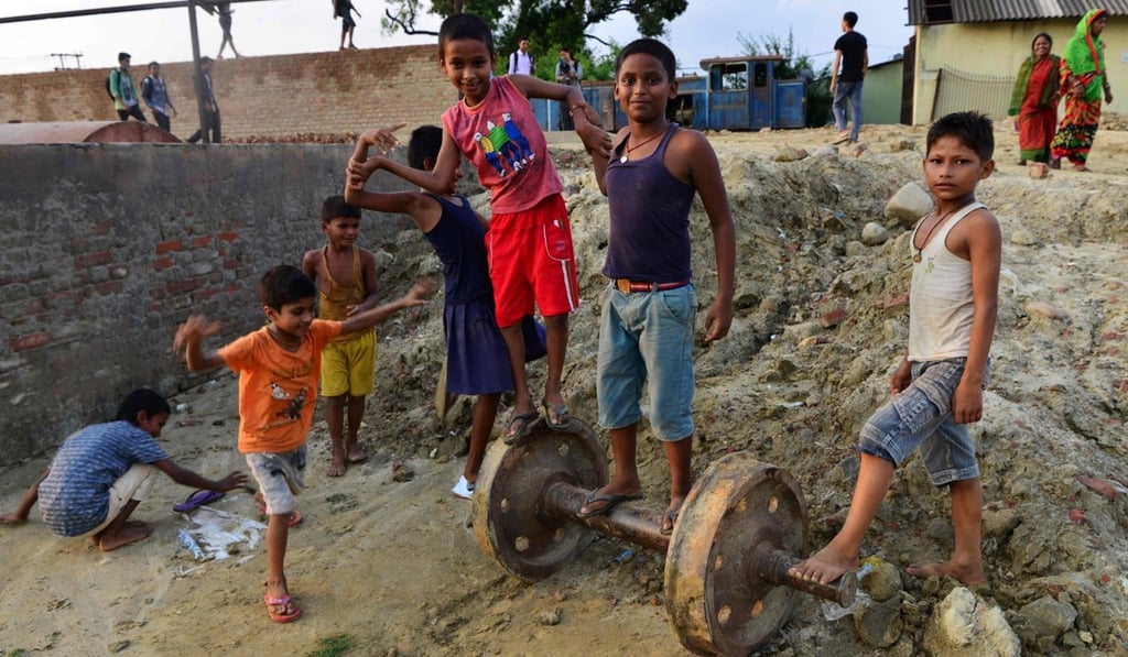 Children play by the abandoned railway. Photo: AFP
