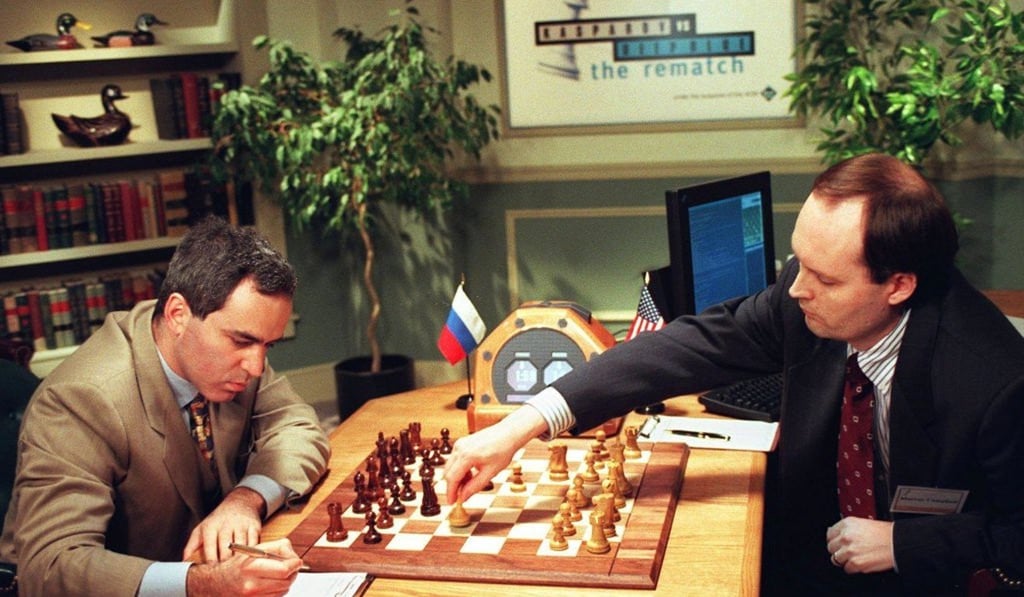 IBM scientist Murray Campbell (right) makes a move for the IBM Deep Blue computer in a chess game in New York against Garry Kasparov. Photo: AFP