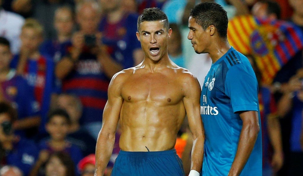 Cristiano Ronaldo took his shirt off after scoring for Real Madrid, which earned him a yellow card. Photo: Reuters