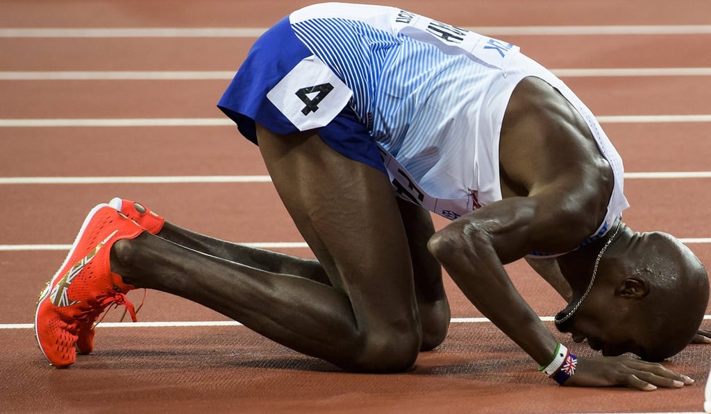 Mo Farah hits the ground in prayer after his silver in the men's 5,000m final at the London 2017 IAAF World Championships. Photo: EPA Mo Farah hits the ground in prayer after his silver in the men's 5,000m final at the London 2017 IAAF World Championships. Photo: EPA