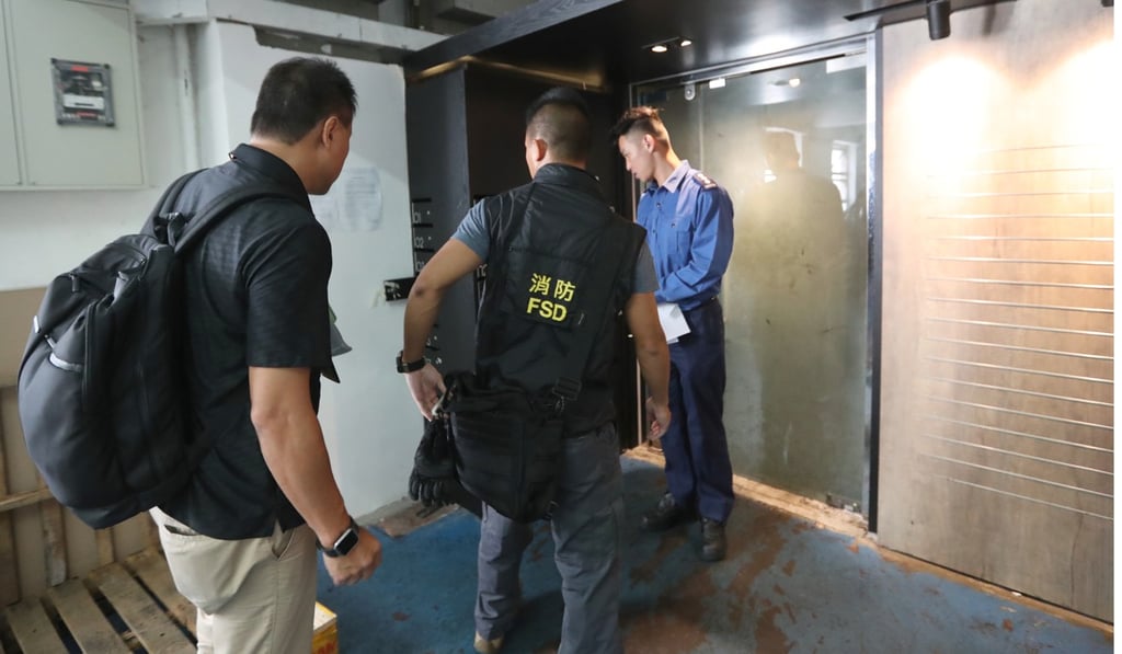 Police and Fire Services Department personnel return to the scene to investigate. Photo: Edward Wong