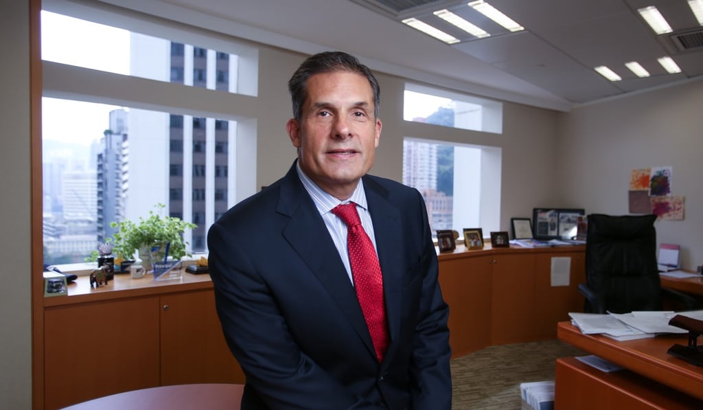 Arthur Bacci, chairman of Hong Kong Investment Funds Association, warned investors to watch for the effects of more accommodative central bank policy. Photo: Xiaomei Chen