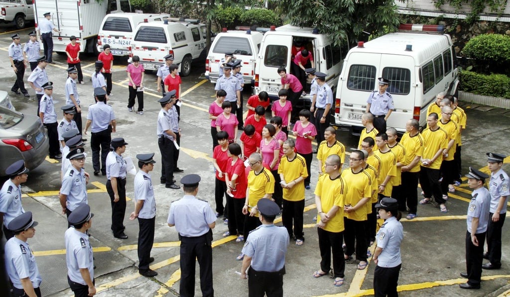 Some of the 47 defendants arrive at Dongguan Intermediate People’s Court in southern China in 2015. Photo: Handout