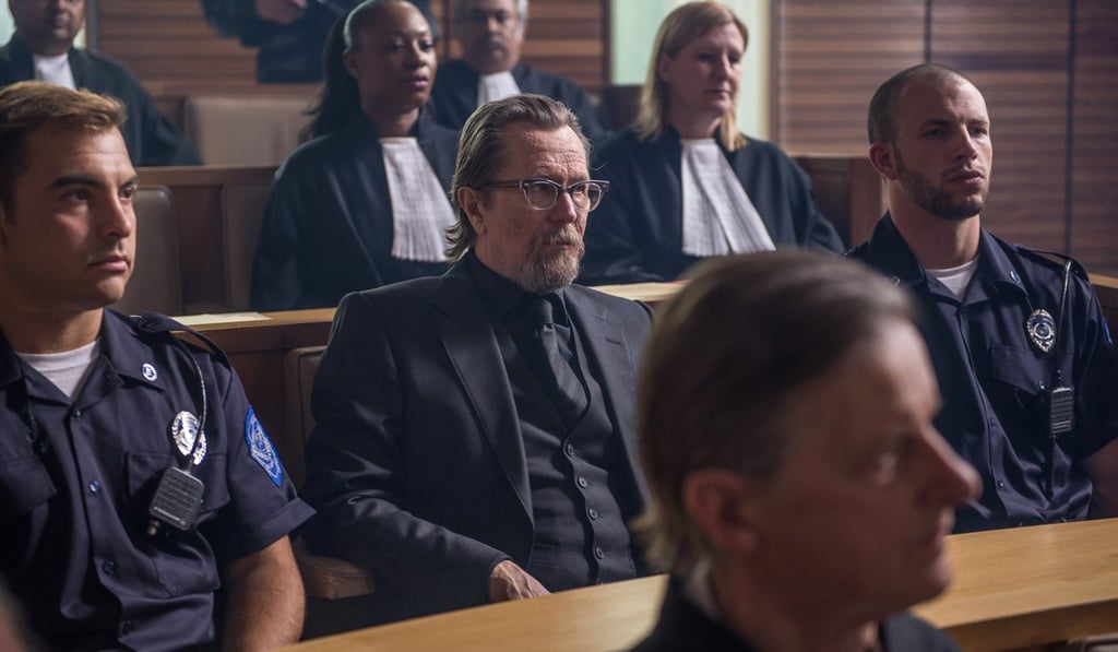 Gary Oldman (centre) in a still from The Hitman’s Bodyguard. Gary Oldman (centre) in a still from The Hitman’s Bodyguard.