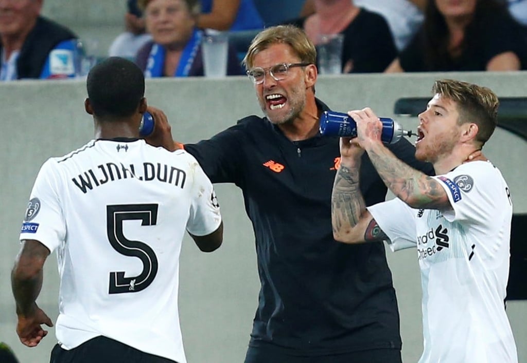 Liverpool manager Jurgen Klopp with Georginio Wijnaldum and Alberto Moreno. Photo: Reuters