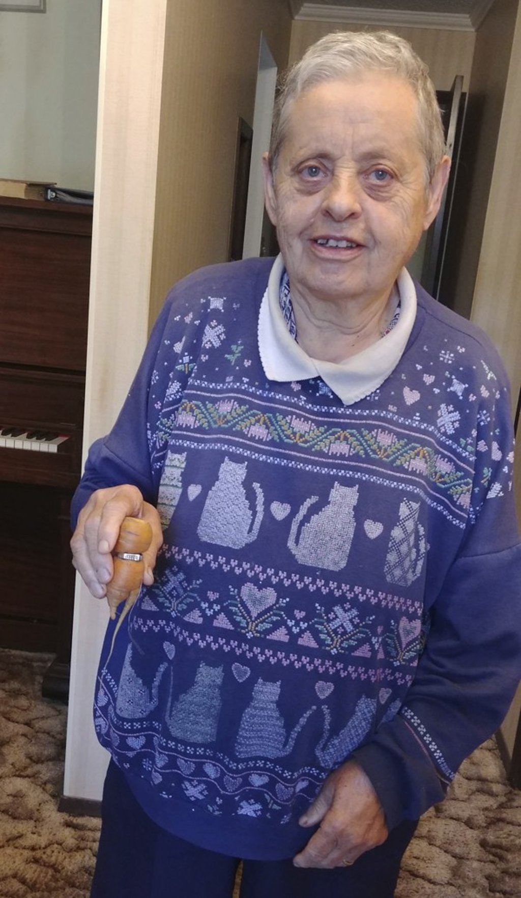 In an undated photo provided by Iva Harberg, Mary Grams, 84, holds a carrot that grew through her engagement ring in Alberta, Canada. Photo: AP In an undated photo provided by Iva Harberg, Mary Grams, 84, holds a carrot that grew through her engagement ring in Alberta, Canada. Photo: AP