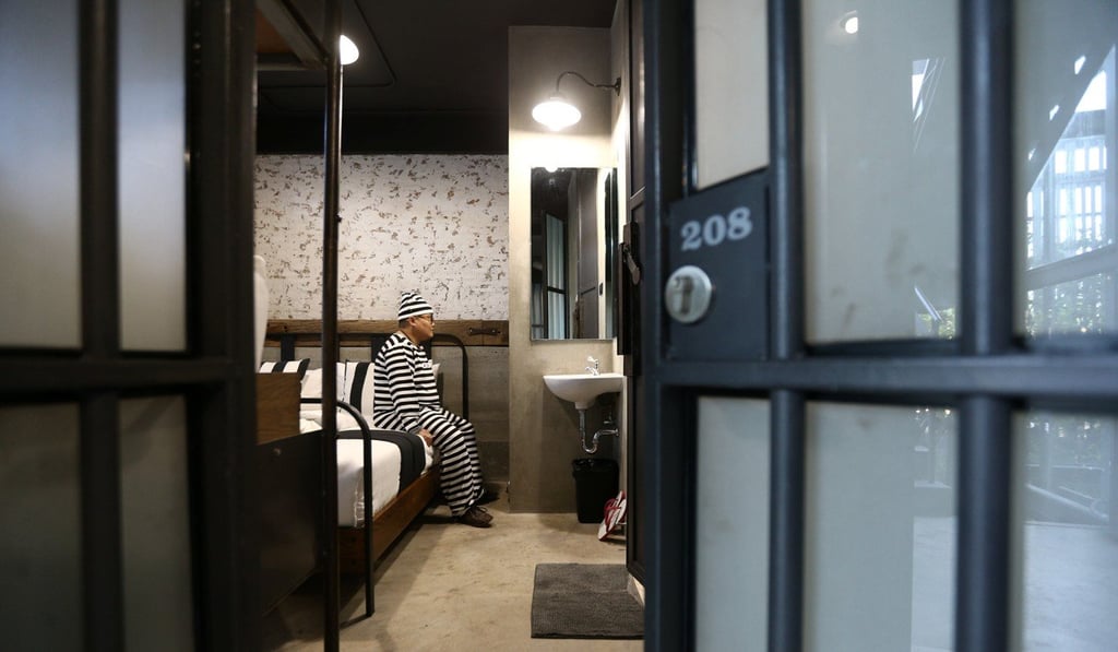 A hotel guest inside her room. Photo: Reuters