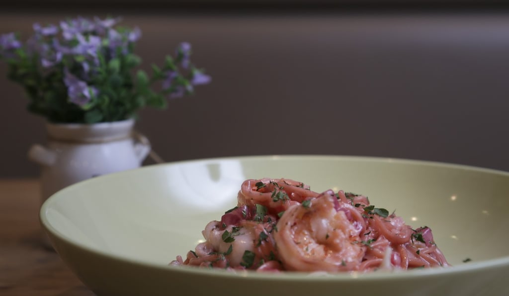 Organic beetroot noodles with baby squid and prawns in light cream sauce. Photo: James Wendlinger