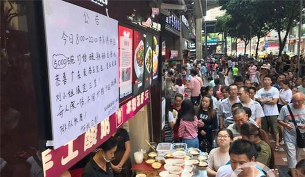 To celebrate the man, named Wang, paid for 5,000 free portions of noodles. Photo: Handout To celebrate the man, named Wang, paid for 5,000 free portions of noodles. Photo: Handout