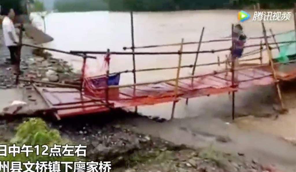 The terrified woman runs for her life as the bridge starts to wobble. Photo: Handout