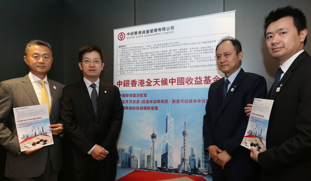 (Left to right) BOCHK Asset Management chief investment officer Ben Yuen, CEO Shen Hua, chief investment officer Han Jian Chiu, and deputy head of equity Carson Lam at a press briefing on Thursday. Photo: Xiaomei Chen