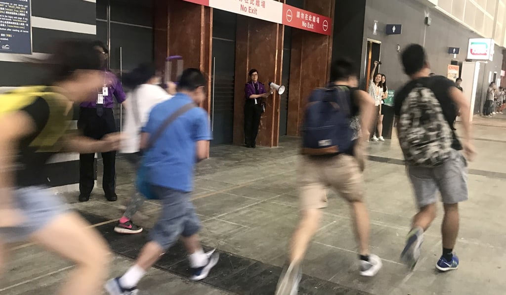 Early birds rushing into the expo at the Convention and Exhibition Centre on Thursday. Photo: Tracy Zhang