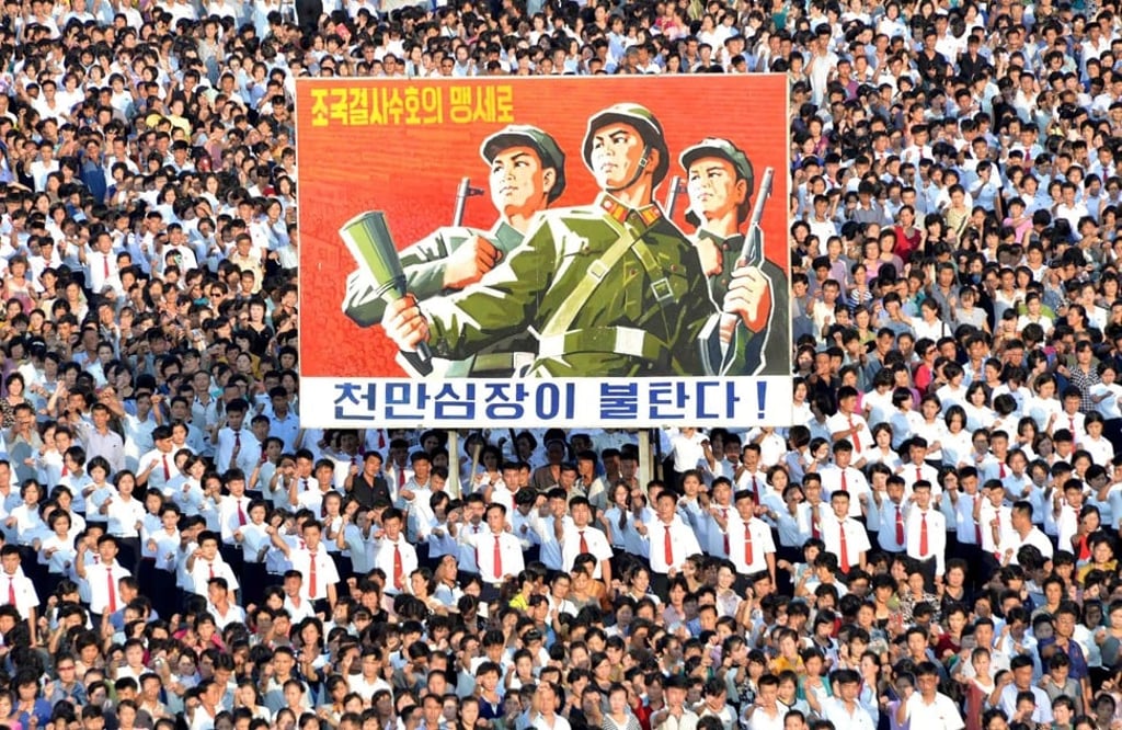 This picture taken on August 9, 2017 and released by North Korea's official Korean Central News Agency (KCNA) on August 10, 2017 shows a rally in support of North Korea's stance against the US, on Kim Il-Sung square in Pyongyang. Photo: AFP PHOTO/KCNA VIA KNS / STR / South Korea