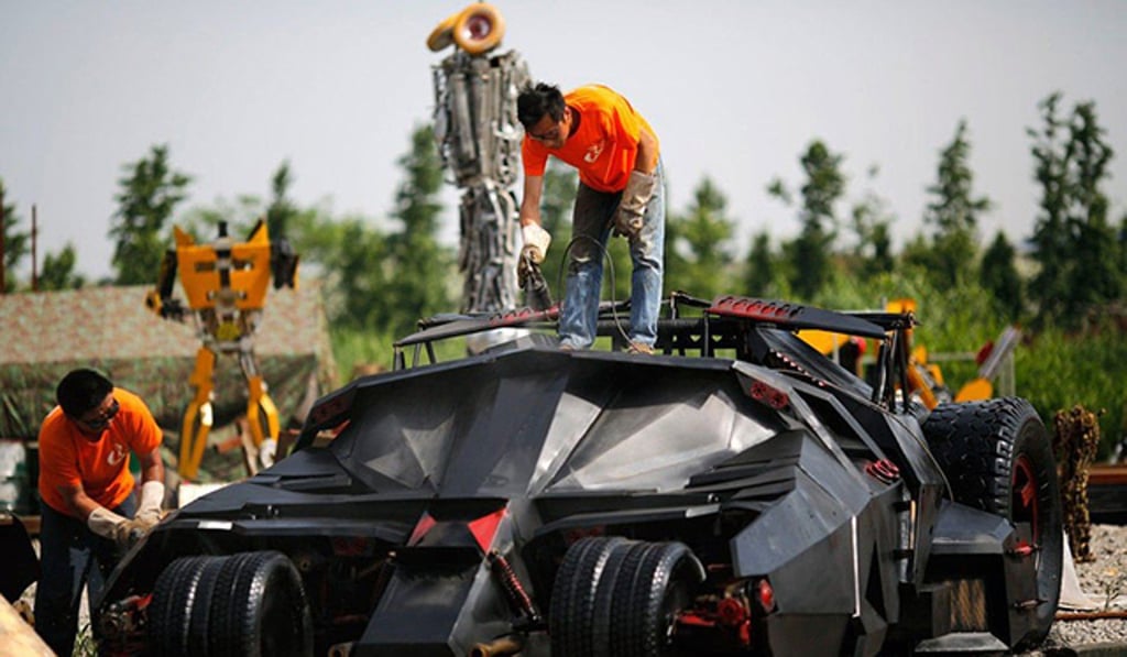 Li Weilei, who built this Batmobile replica, says that a dozen of these life-sized replicas have been created. Photo: Screenshot via Sina Weibo