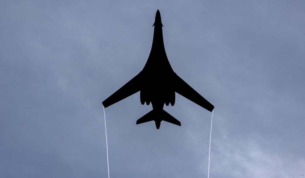 A US B1-B Lancer bomber flies over Andersen Air Force Base in Hagata, Guam. Photo: AP