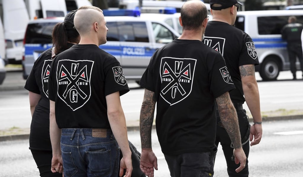 Far-right members gather to commemorate the death of Adolf Hitler's deputy, Rudolf Hess, in Berlin. Photo: AP Far-right members gather to commemorate the death of Adolf Hitler's deputy, Rudolf Hess, in Berlin. Photo: AP