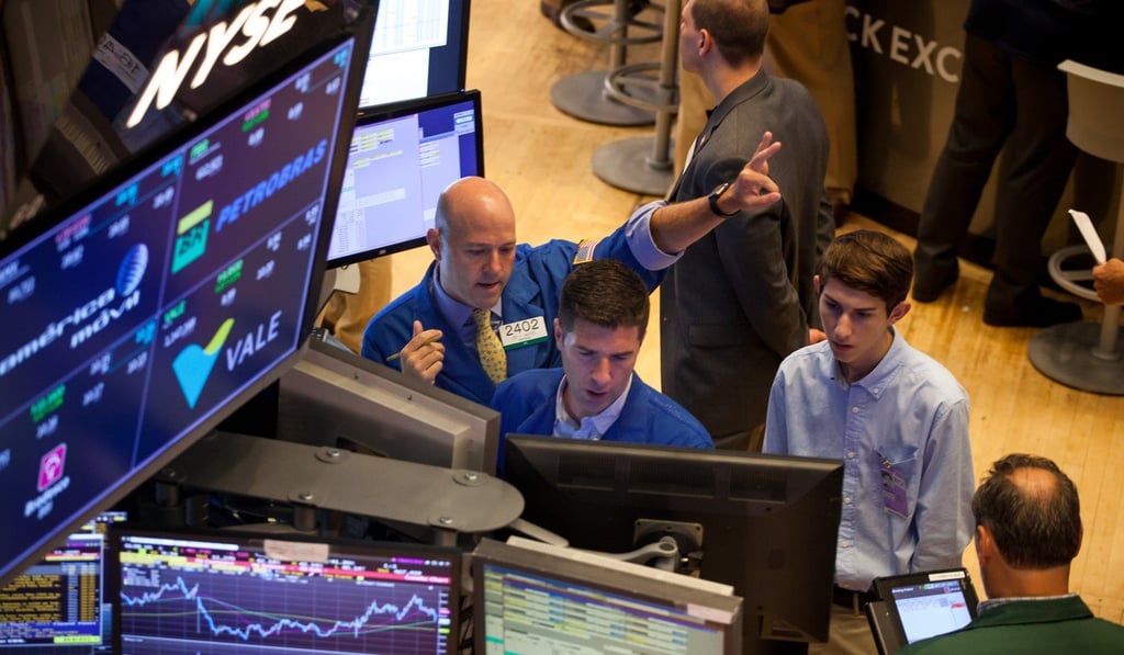Action in the New York Stock Exchange (NYSE) as stocks continued to reel from Donald Trump’s political woes and the terror attacks in Spain. Photo: Bloomberg