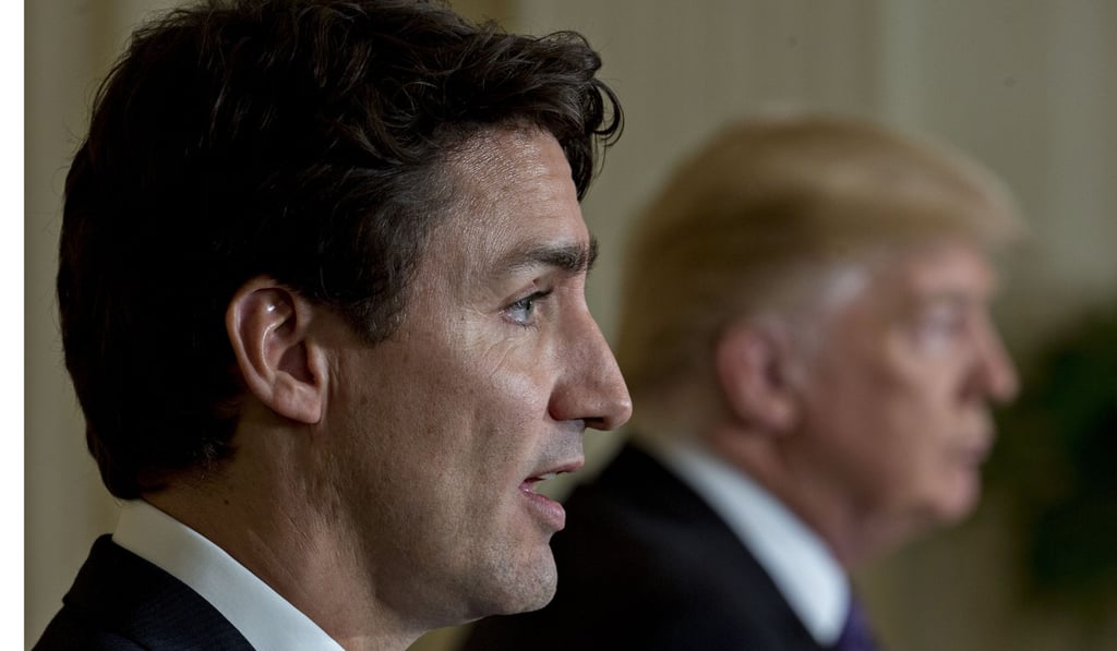 Canadian Prime Minister Justin Trudeau speaks as President Donald Trump (right) listens during a news conference at the White House in Washington early this year. Photo: Bloomberg
