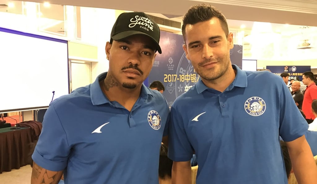 Guangzhou R&F’s Bruninho and Giovane da Silva. Photo: Chan Kin-wa