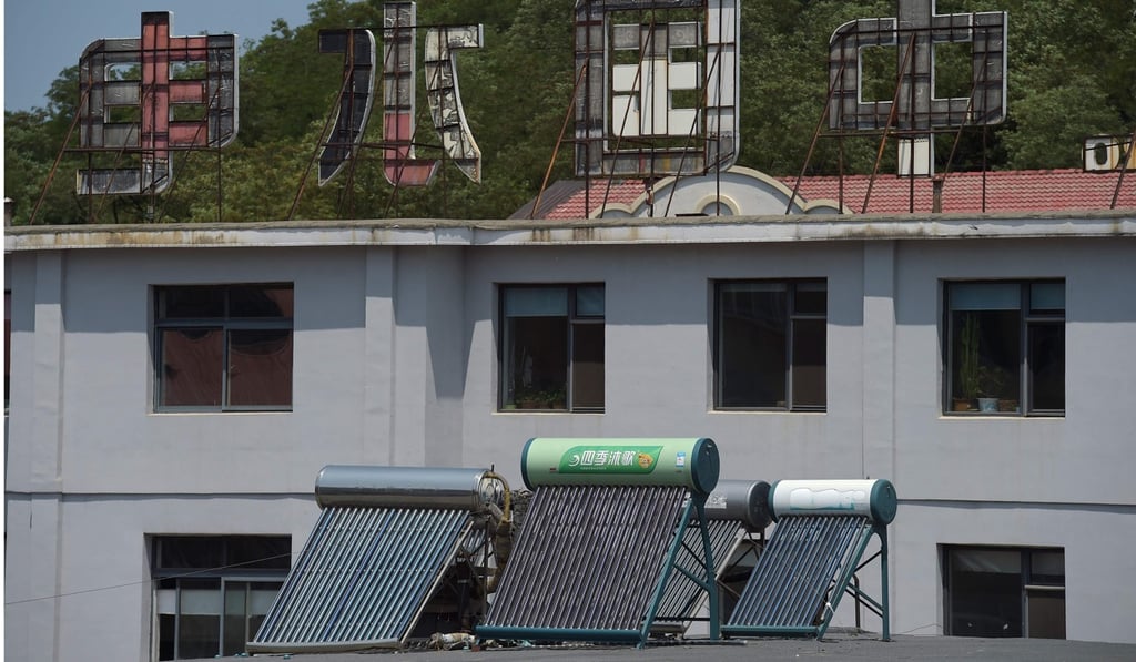 Solar panels on the roof of a building in Dandong. Vendors in the city have reported a steady stream of orders from North Korea. Photo: AFP