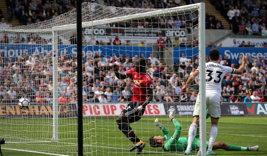 United’s Eric Bailly scores the opening goal for his team. Photo: EPA