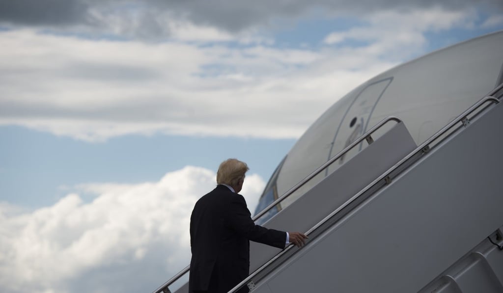 US President Donald Trump boards Air Force One. Photo: AFP US President Donald Trump boards Air Force One. Photo: AFP