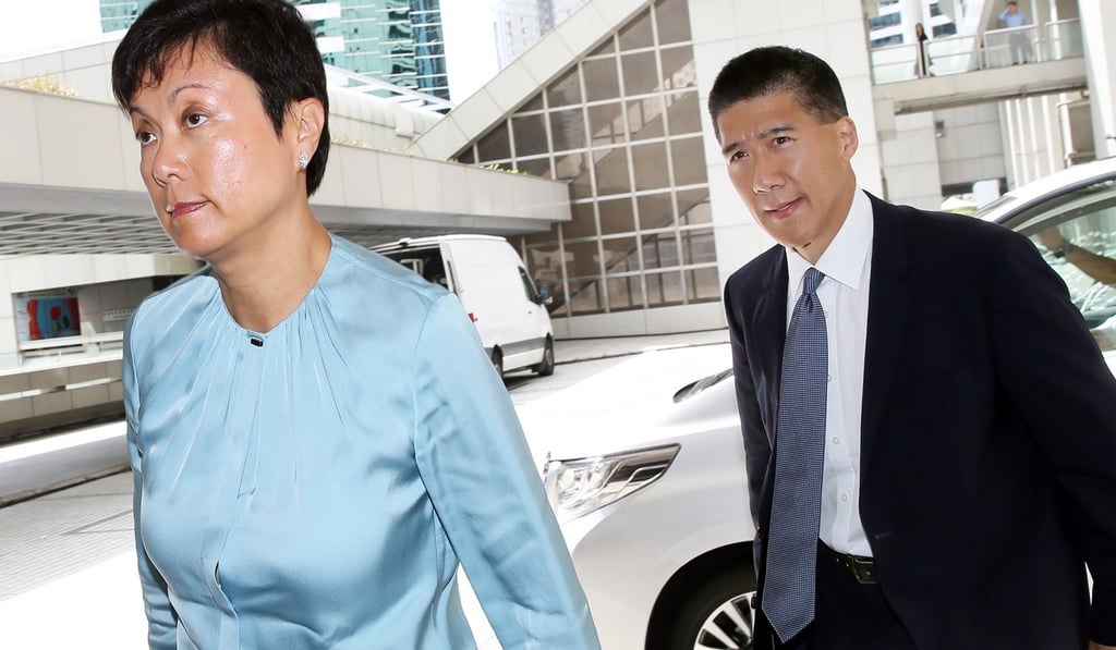Carl Lu arrives at court with his wife last year. Photo: Sam Tsang